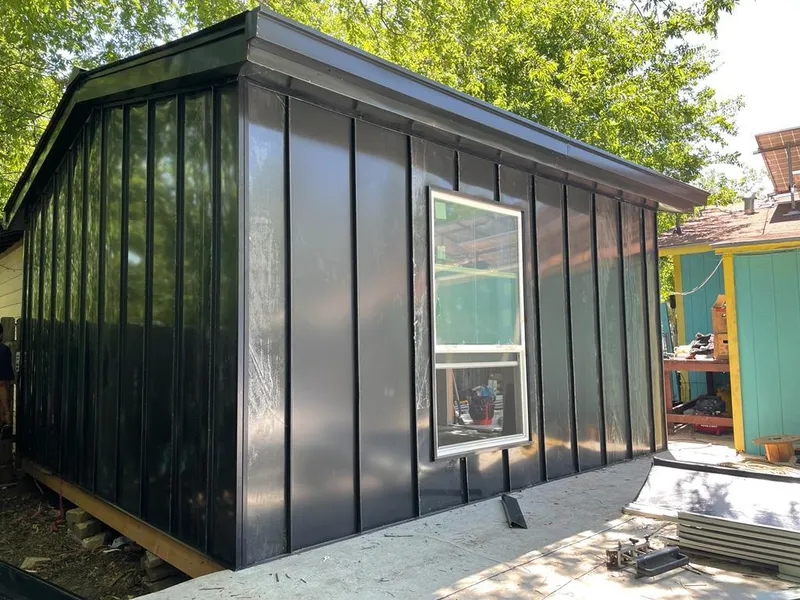 Black standing seam metal wall panels for Metal Roof Installation in Hampton