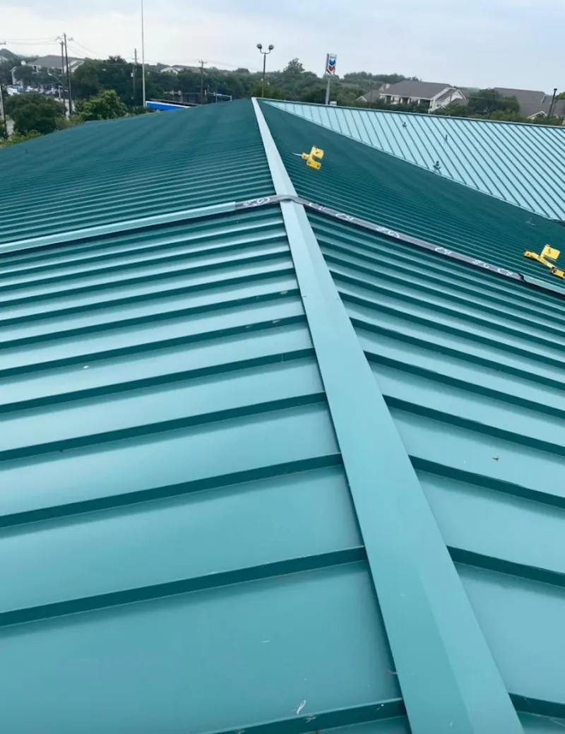 Green commercial metal roof ridge and valley for Metal Roof Repair in Hampton
